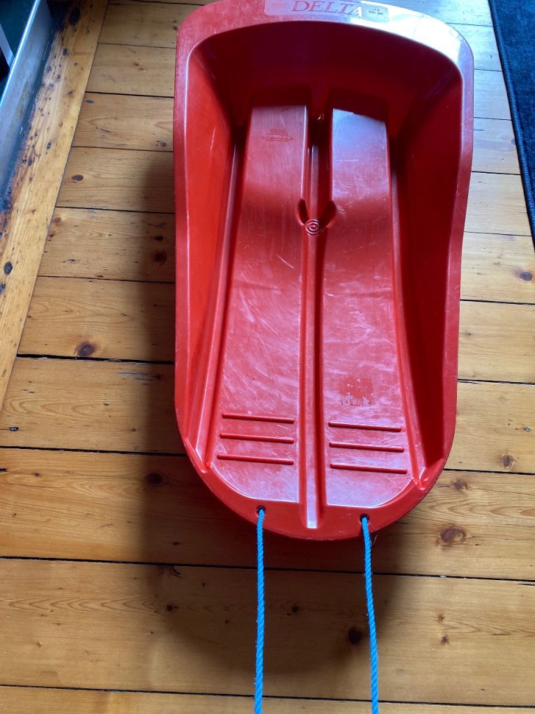 Delta Red Plastic Sledge with Rope – Good Condition