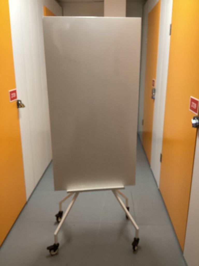 Office /training room white board with pinboard on casters.