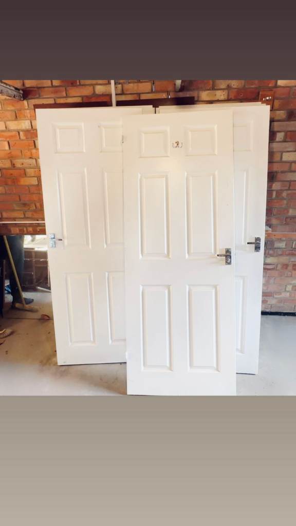 9 units of White 6 panel internal doors