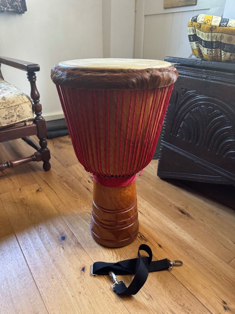 Traditional djembe drum with cover, strap and case