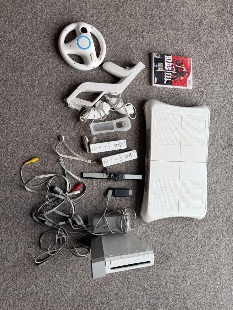Nintendo Wii Bundle + Balance Board + 2 Remotes + 2 Nunchucks + HDMI Adapter
