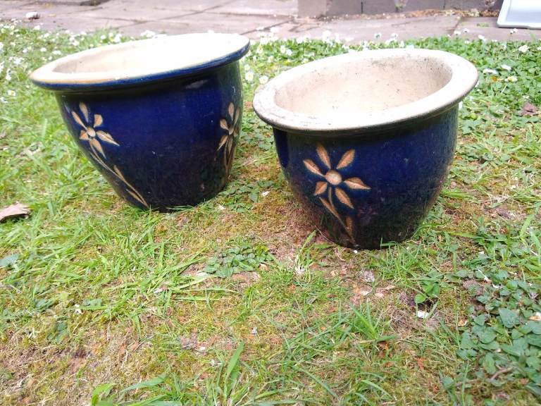 Pair of Ceramic Plant Pots, Deep Blue Glazes with Flower Motifs, 26cm and 21cm Diameters.