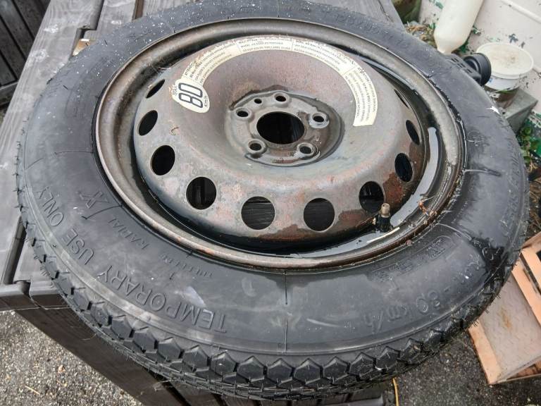 Michelin Space Saver Spare Wheel. Tyre as new. Wheel with surface rust. Should clean up. See pics.
