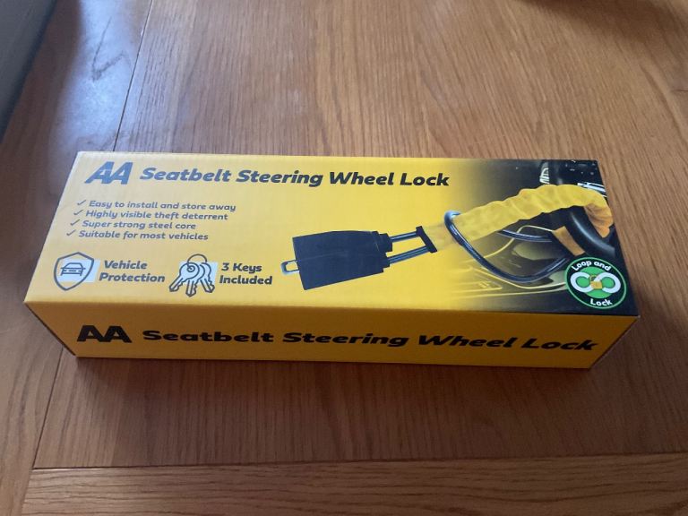 Seatbelt Steering Wheel Lock. Brand New / Sealed