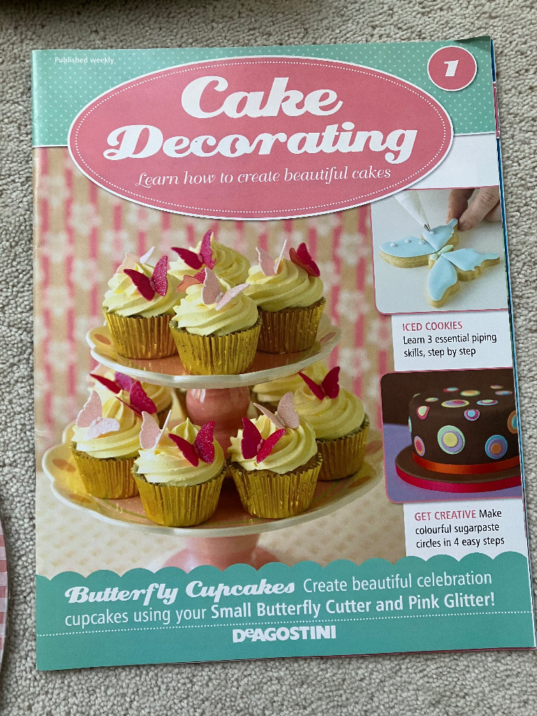 Baking: Mini cupcake trays, Cake decorating booklet and 2 tier cupcake stand. 