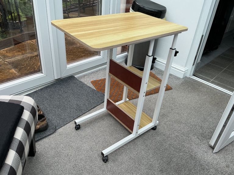 Overbed table on wheels
