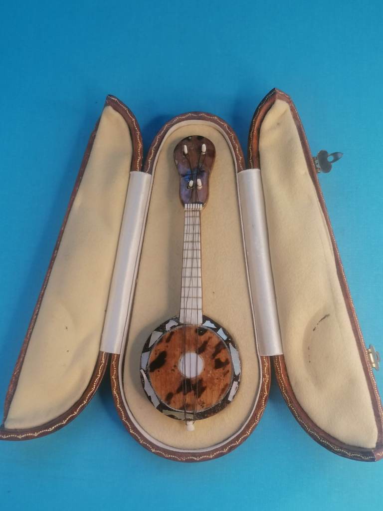 Antique miniature tortoiseshell covered model of a banjo with original real Leather Case.