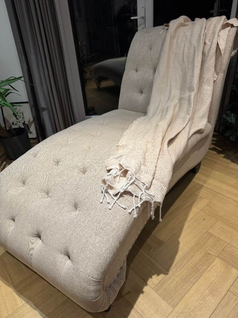 Large Beige Chaise Lounge with four post legs 