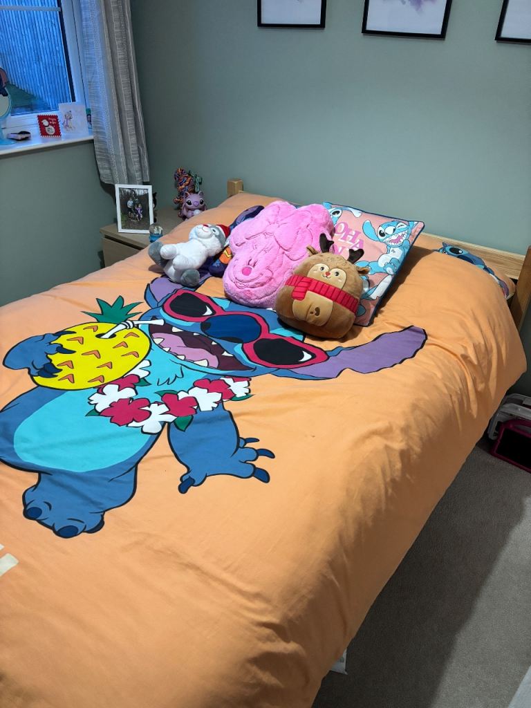 Double wooden bed with mattress