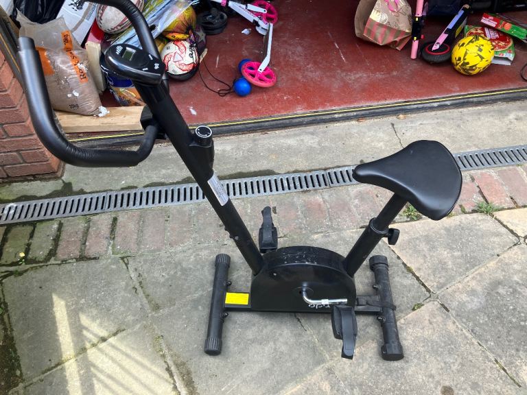 Black Home Exercise Bike - Good Condition, Ready for Use