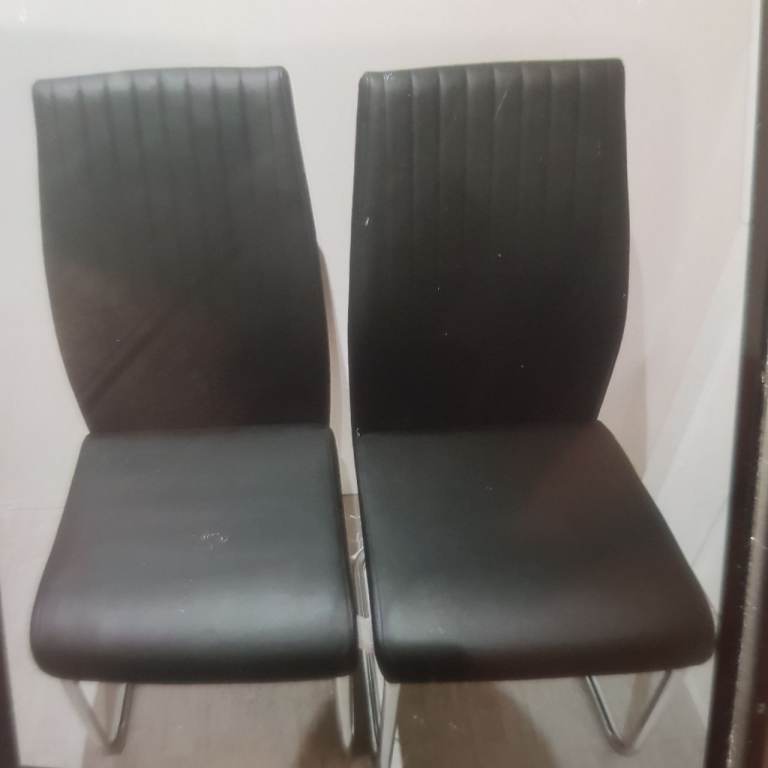 Pair of Black Dining Chairs with Chrome Legs – Good Condition