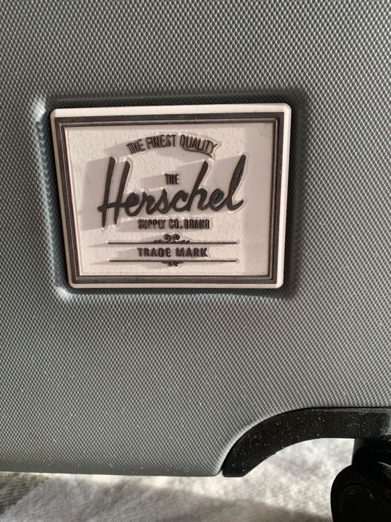 Large Hershel hard shell suitcase