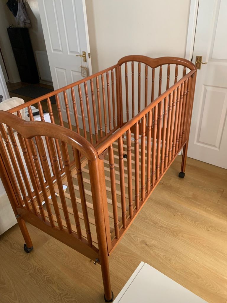 Wooden Baby Cot Bed with Wheels – Good Condition