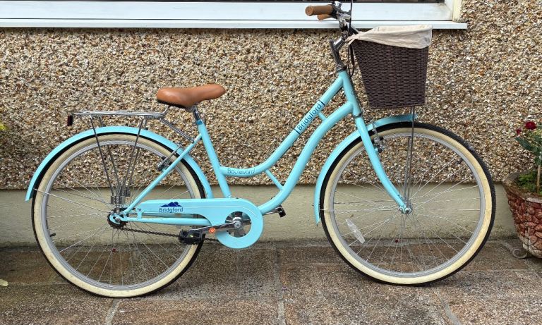 Light Blue City Bike with Basket and Rack – Good Condition