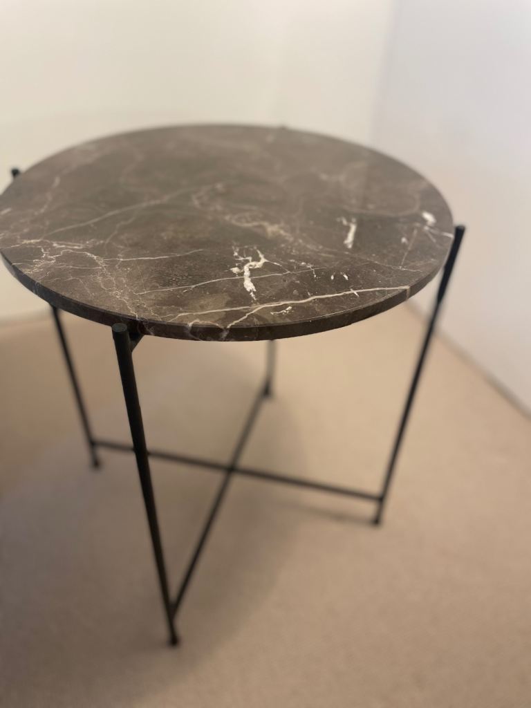 Marble topped bedside tables