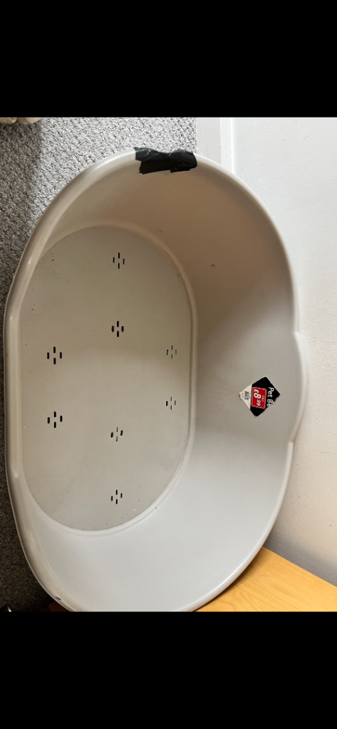 FREE large plastic dog bed 