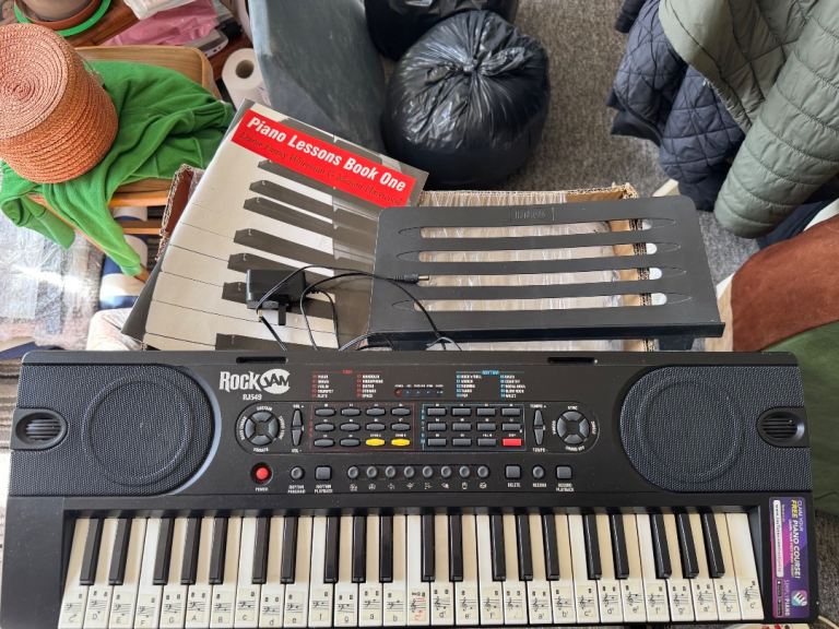 RockJam 49-Key Keyboard Starter Kit, Includes Book & Stand.