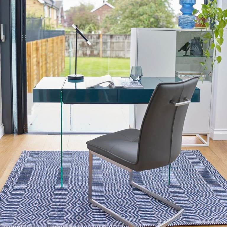 Teal desk with glass legs and with drawers