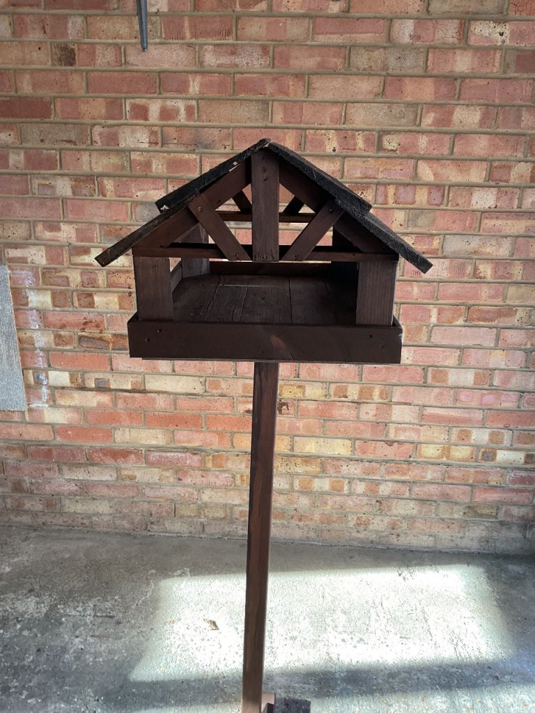 Wooden bird feeding table