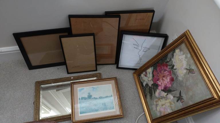 image for Assorted gold and black frames and one small gold framed mirror 