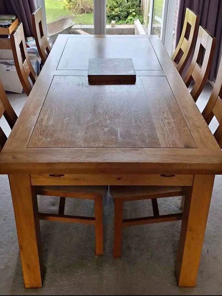 Oak dining table and 8 chairs