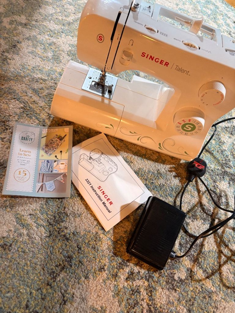 Singer Talent 3321 sewing machine boxes and carry bag