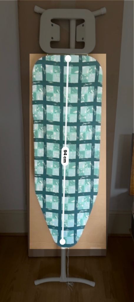 Ironing Board — small and light (looks old and beat up; but fully functional and stable) 