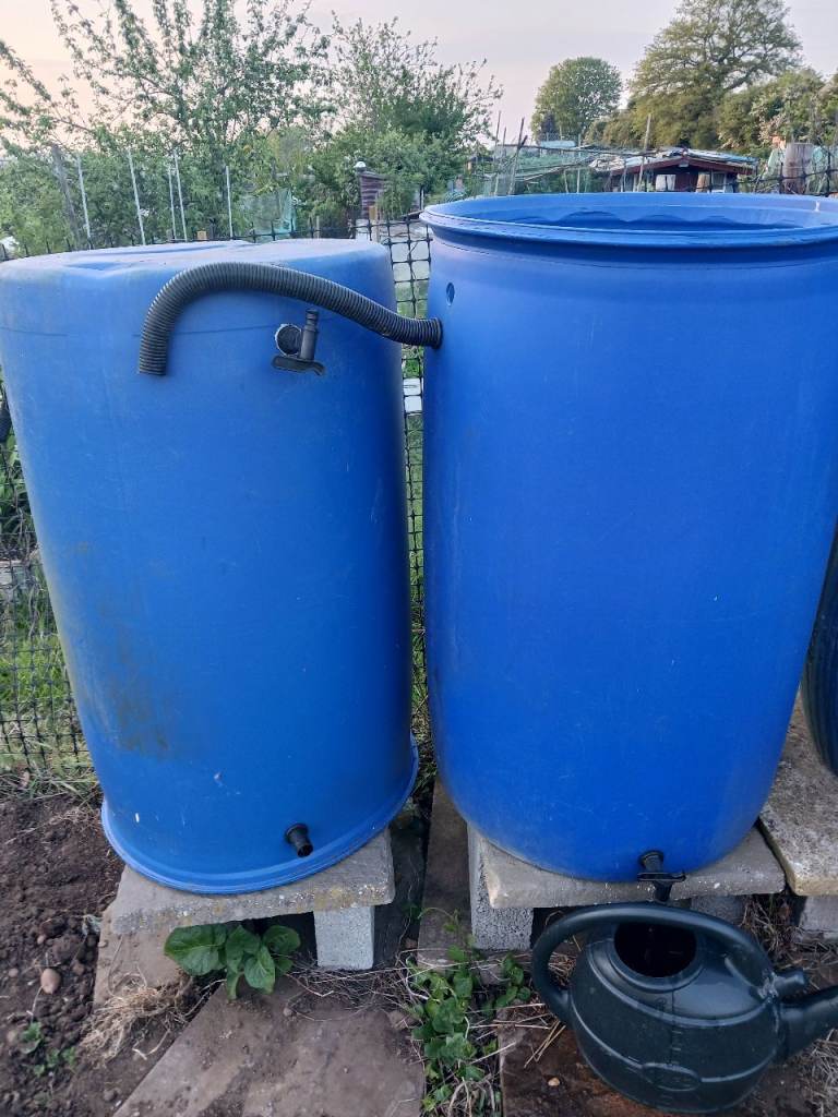 4 Water Barrels - Used (no lids)