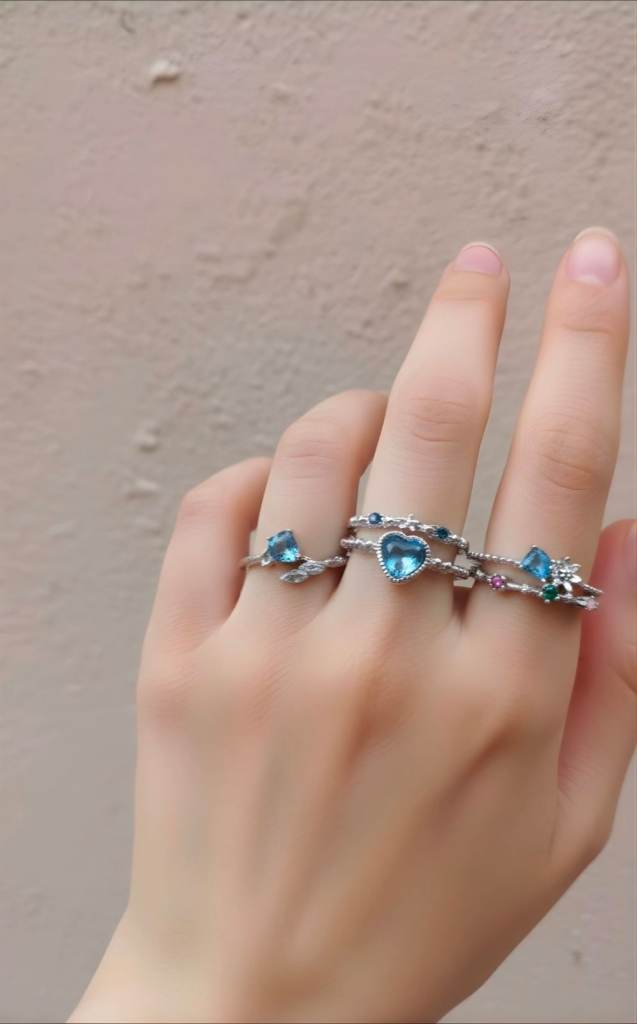 Beautiful Set of Three Silver-Tone Rings with Blue Gemstones