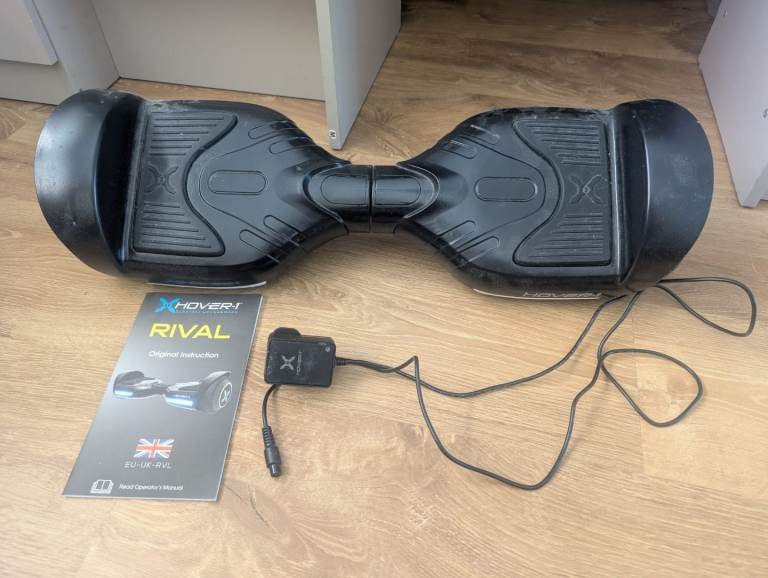 Xhover Rival Hoverboard with Charger and Manual – Good Condition