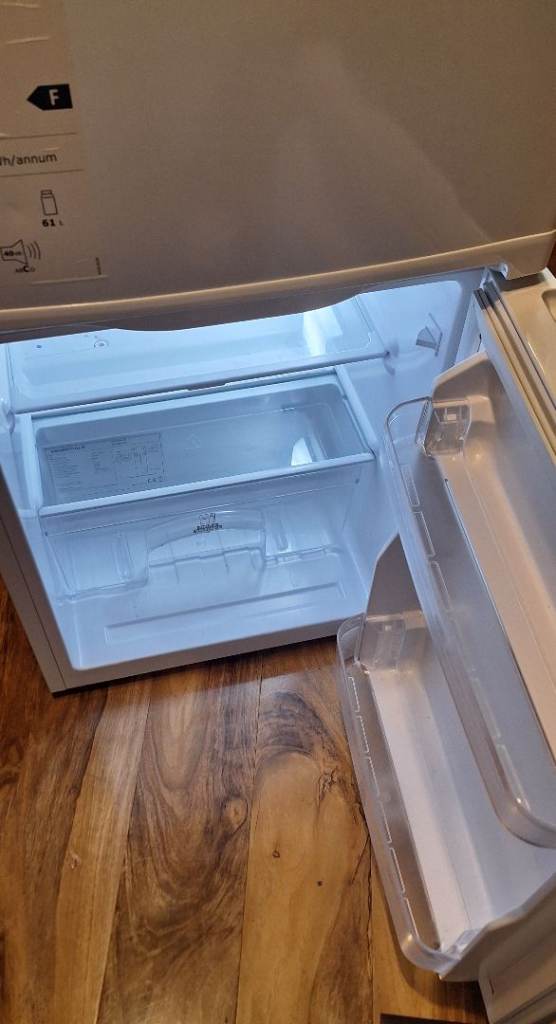 Essentials under counter fridge freezer model number:CUC50W20. In excellent condition 3 years old
