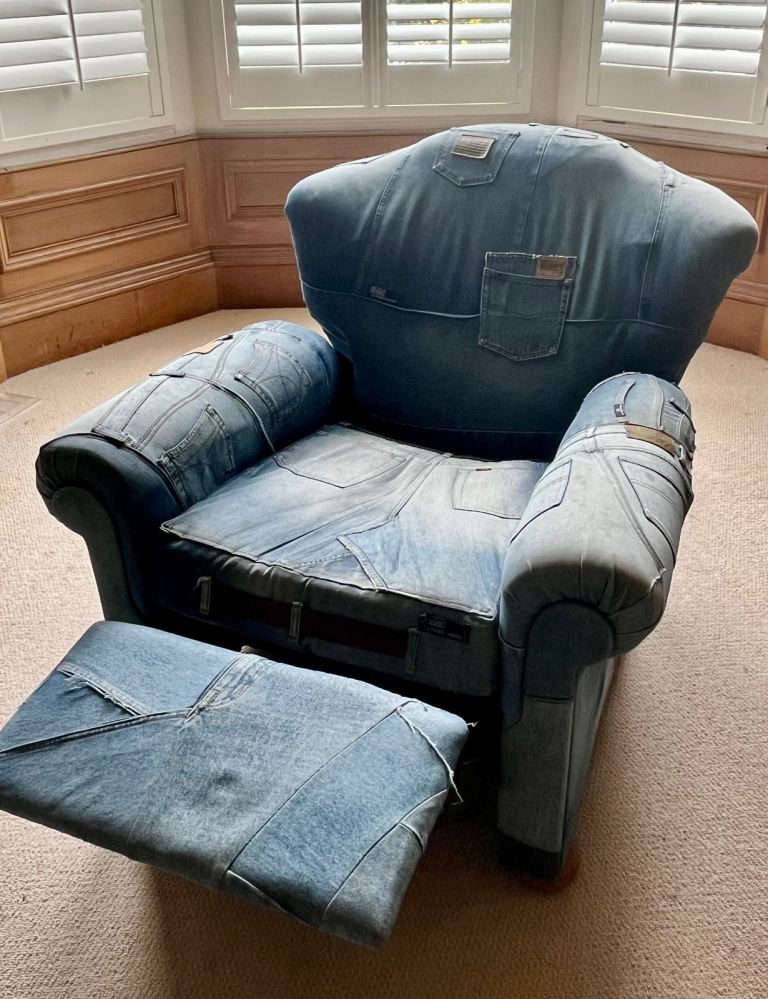 Arm chair - with fold out foot rest.