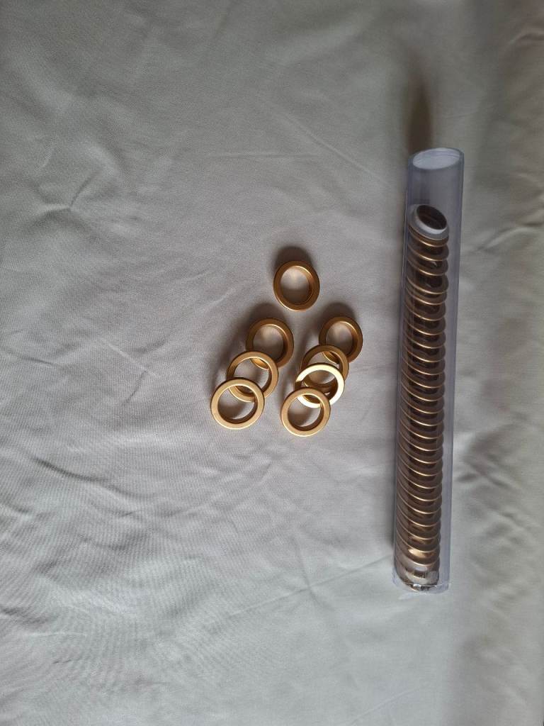 Brand new curtain eyelets and tape