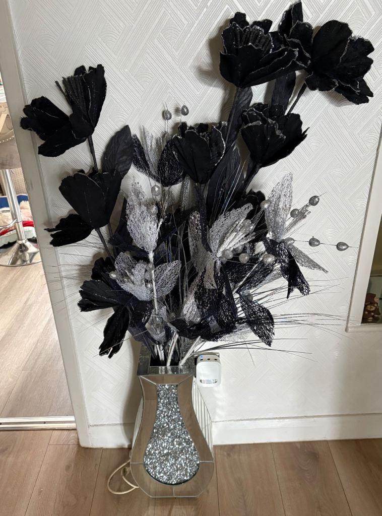 Black and Silver Decorative Vase with Artificial Flowers