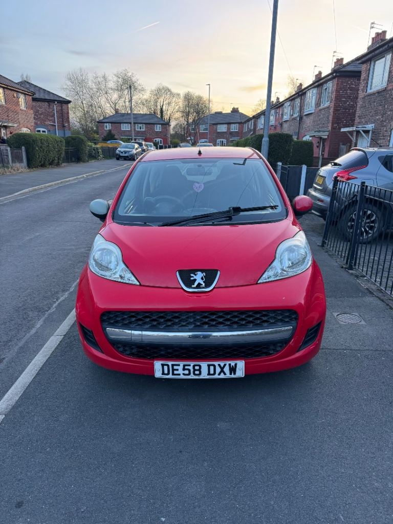 Red Peugeot 107