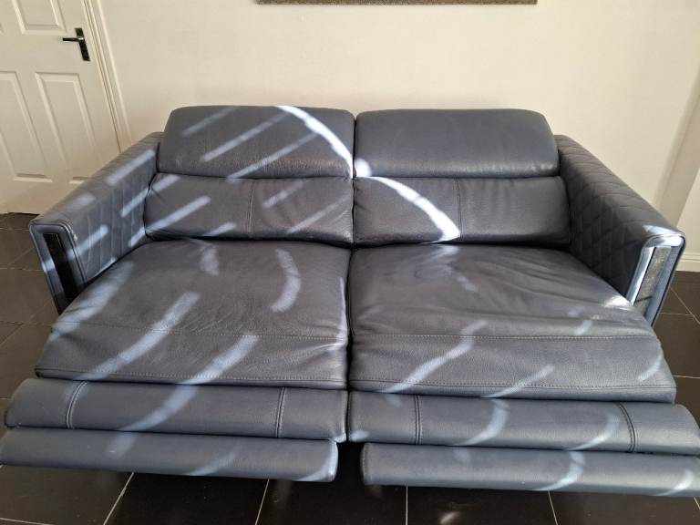 DFS leather electric recliner sofa in denim blue