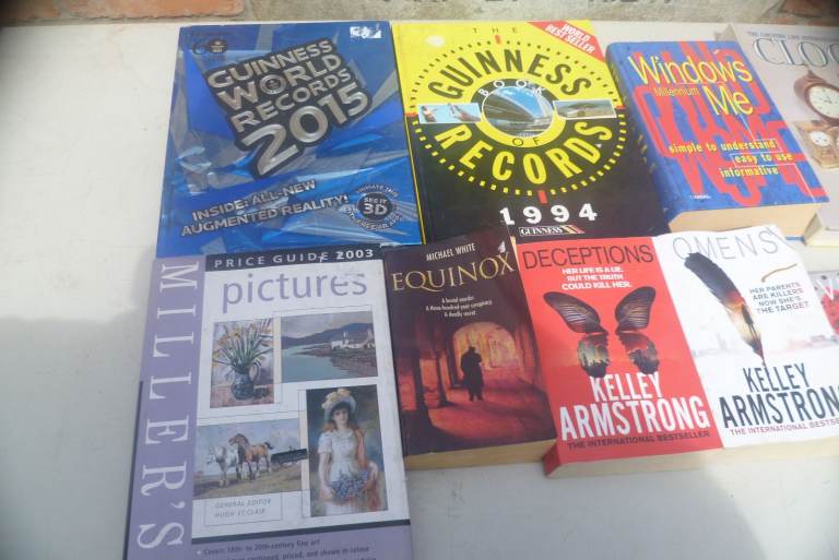 Books collection inc clocks windows me guinness book of records etc 
