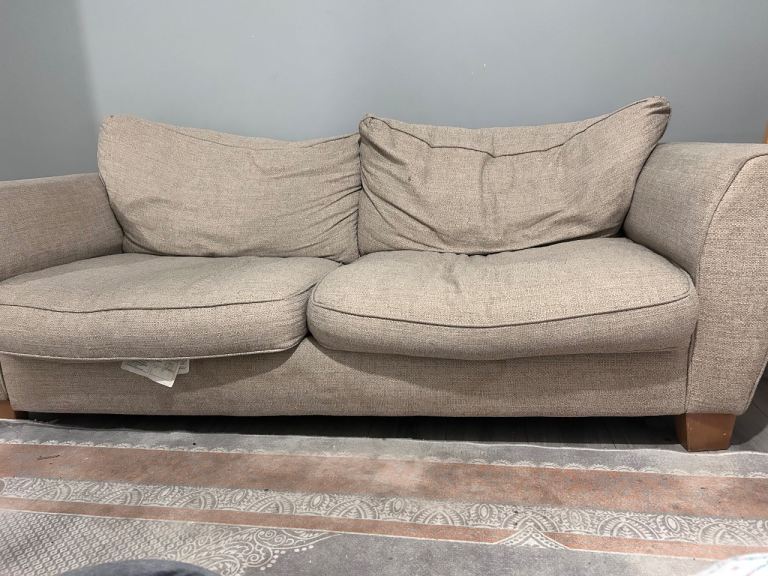 Comfortable Two-Seater Sofa – Beige Fabric, Good Condition