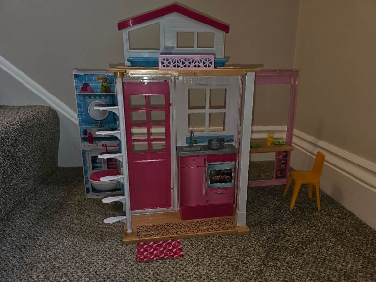 image for Barbie 2 story folding house and doll. Excellent condition.  Ideal Christmas present