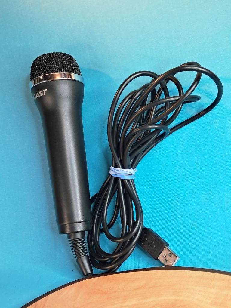 Here is a black Logitech USB wired microphone,often used for karaoke and singing games