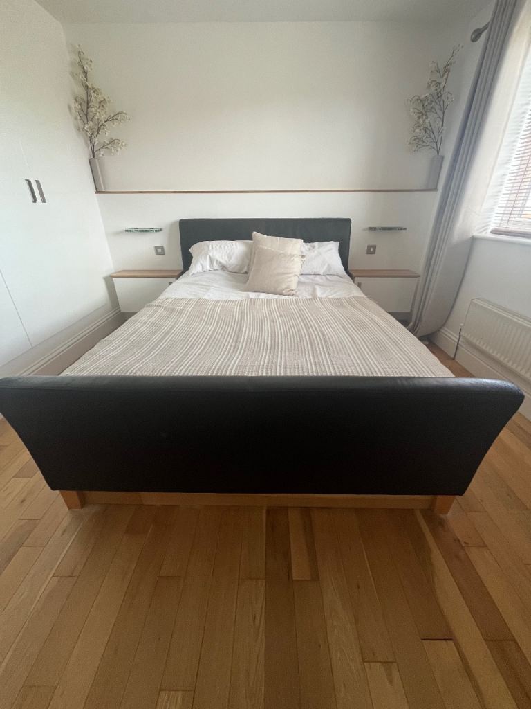 King Bed with Brown Faux Leather Headboard and Footboard