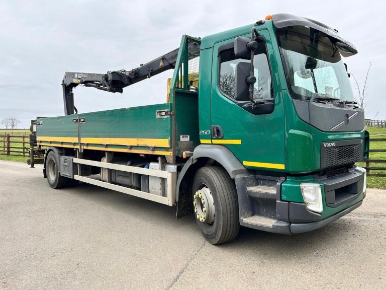 2015 VOLVO FL 250 18T DROPSIDE WITH HMF 1210 CRANE