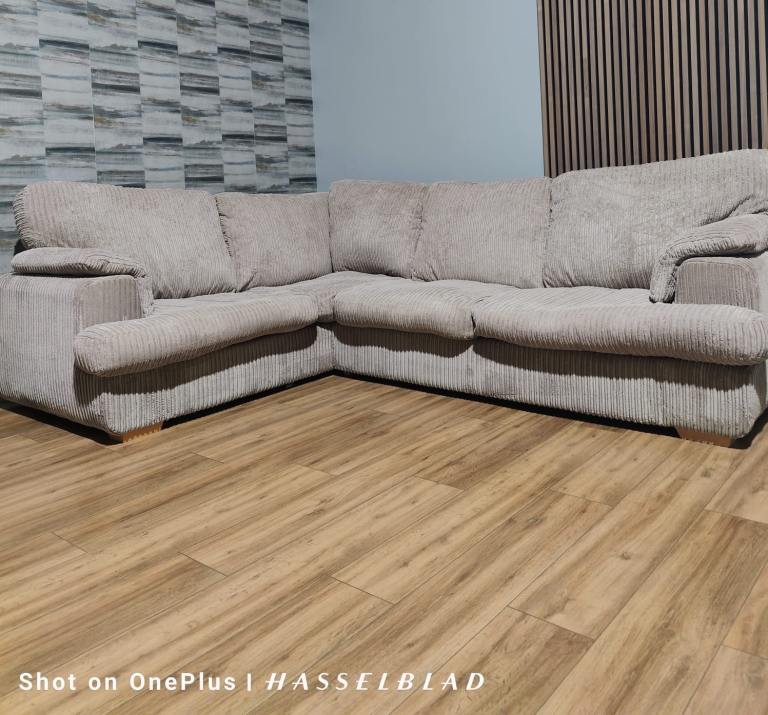 Large beige DFS Corner Sofa Bed  with footstool + free delivery