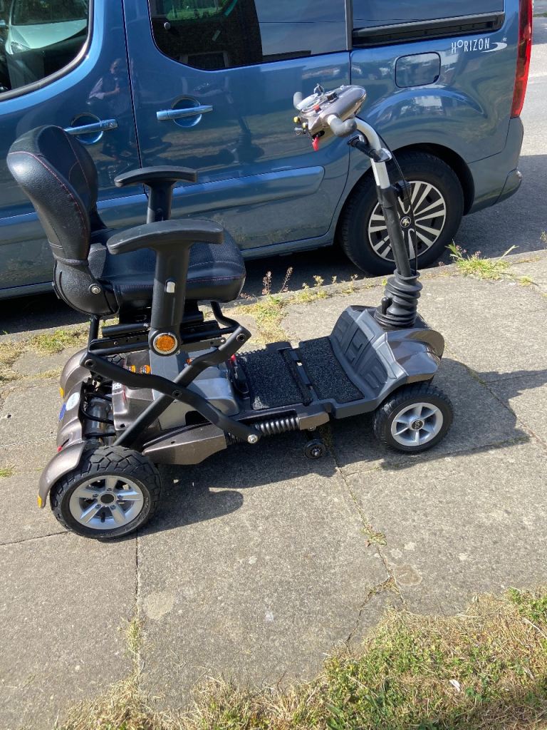 TGA folding mobility scooter with Ramps 