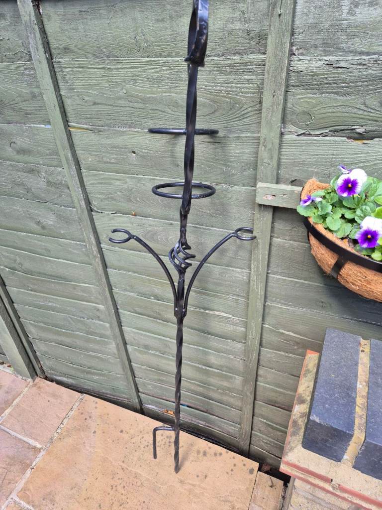 Wrought iron garden wine bottle and glass holder