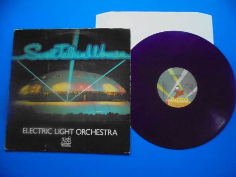 ELO -  Sweet Talkin' Woman/Bluebird Is Dead. 12" Purple Vinyl. EX+/W