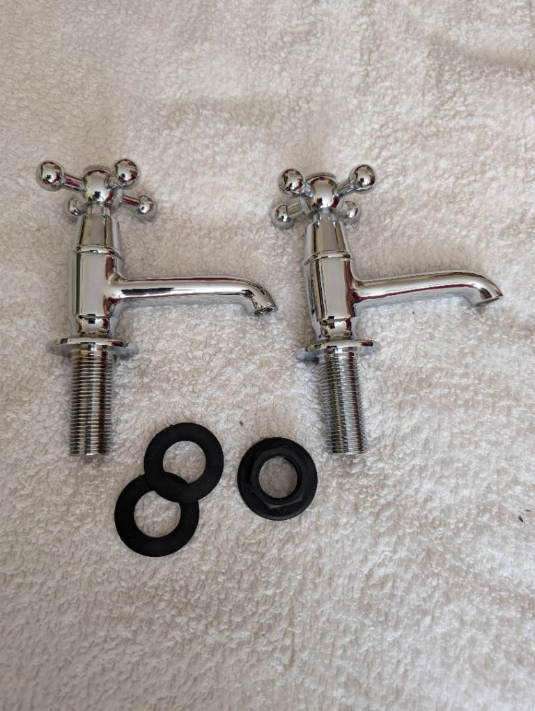 Chrome basin taps