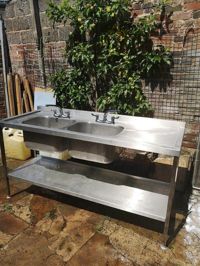 Double bowl pure stainless steel sink  with taps Refurbished.