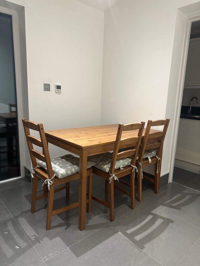 Wooden kitchen dining table & 3 chairs 