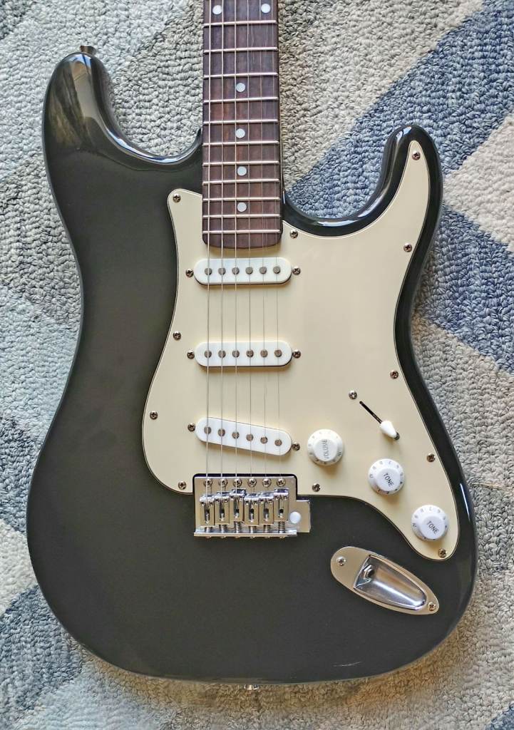 Lovely Black & White Strat style guitar